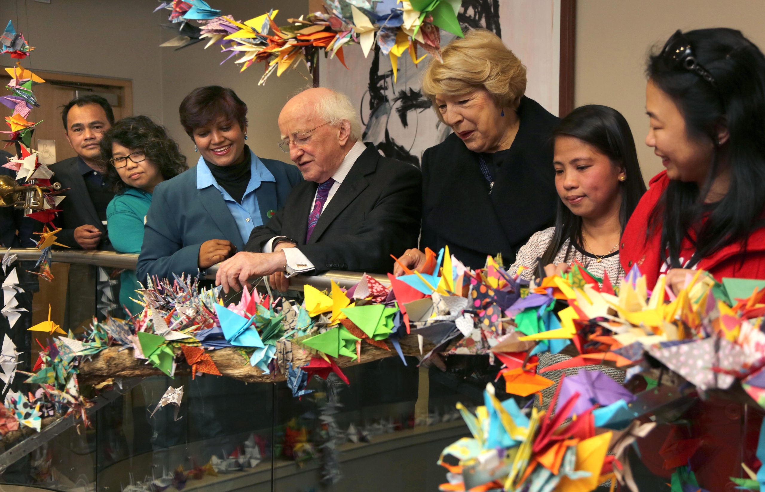 President Higgins visits art installation created by undocumented migrants
